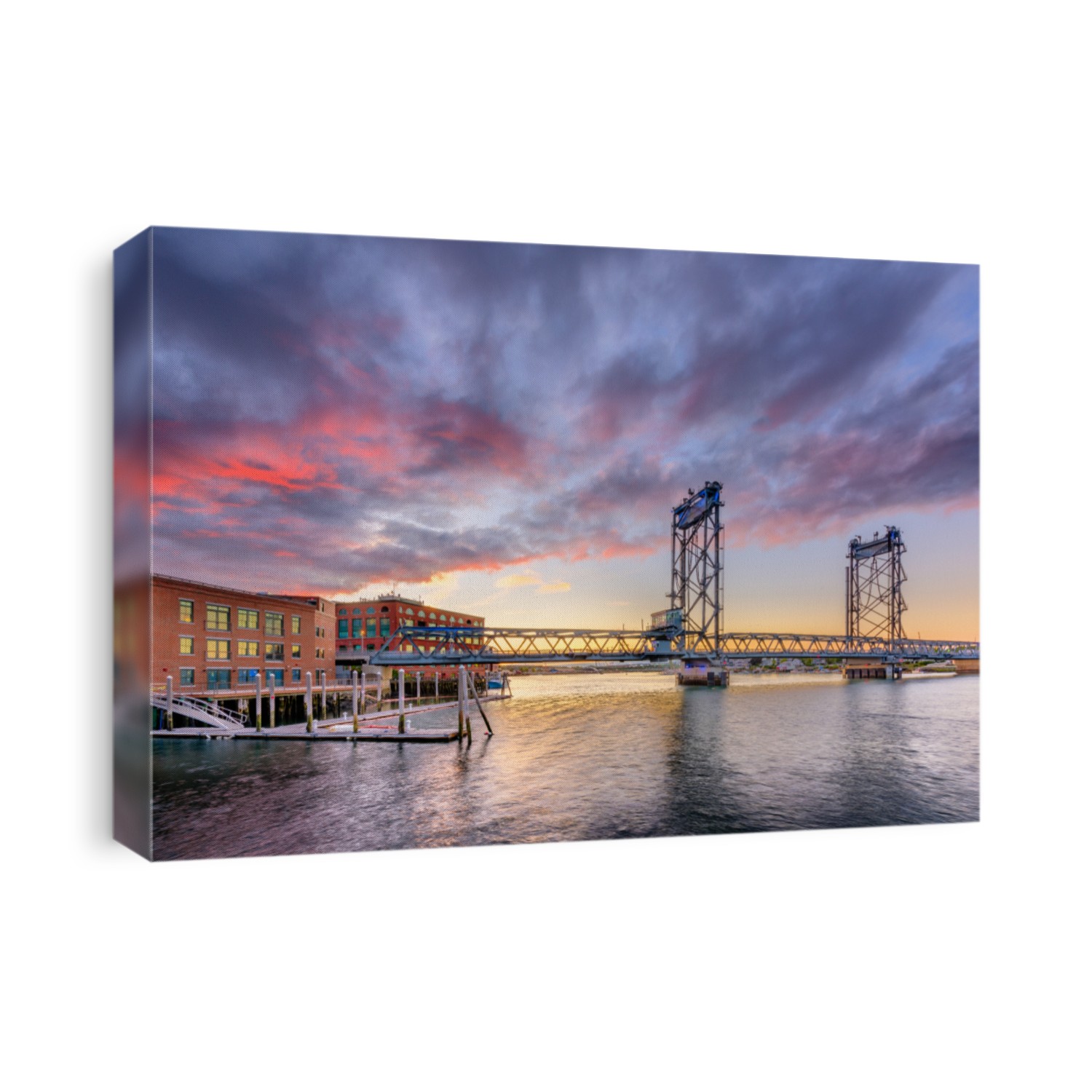 Portsmouth, New Hampshire, USA at Memorial Bridge on the Piscataqua River at dusk.