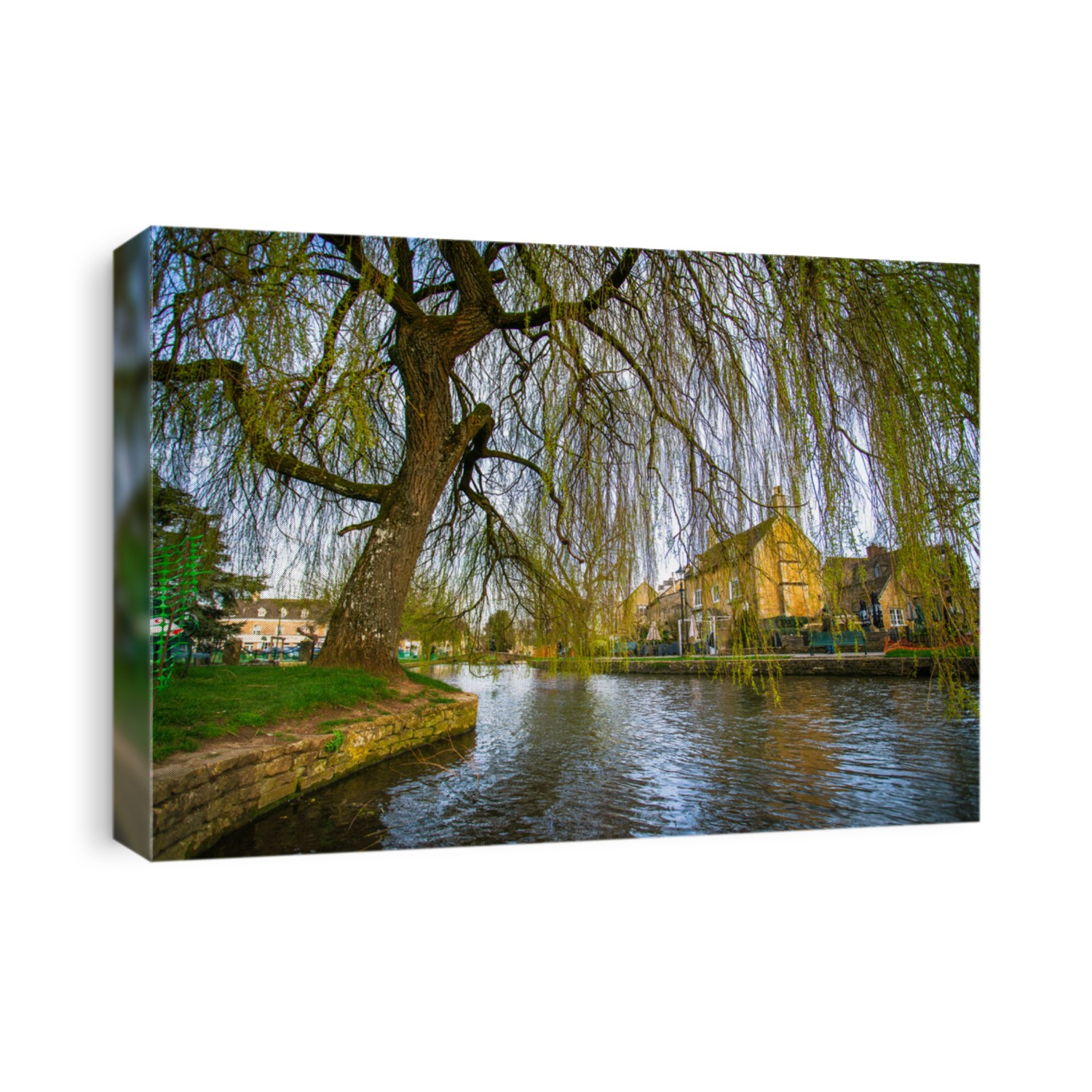 Bourton on the Water, a village and civil parish in Gloucestershire lies on a wide flat vale within the Cotswolds Area of Outstanding Natural Beauty (AONB), England, UK