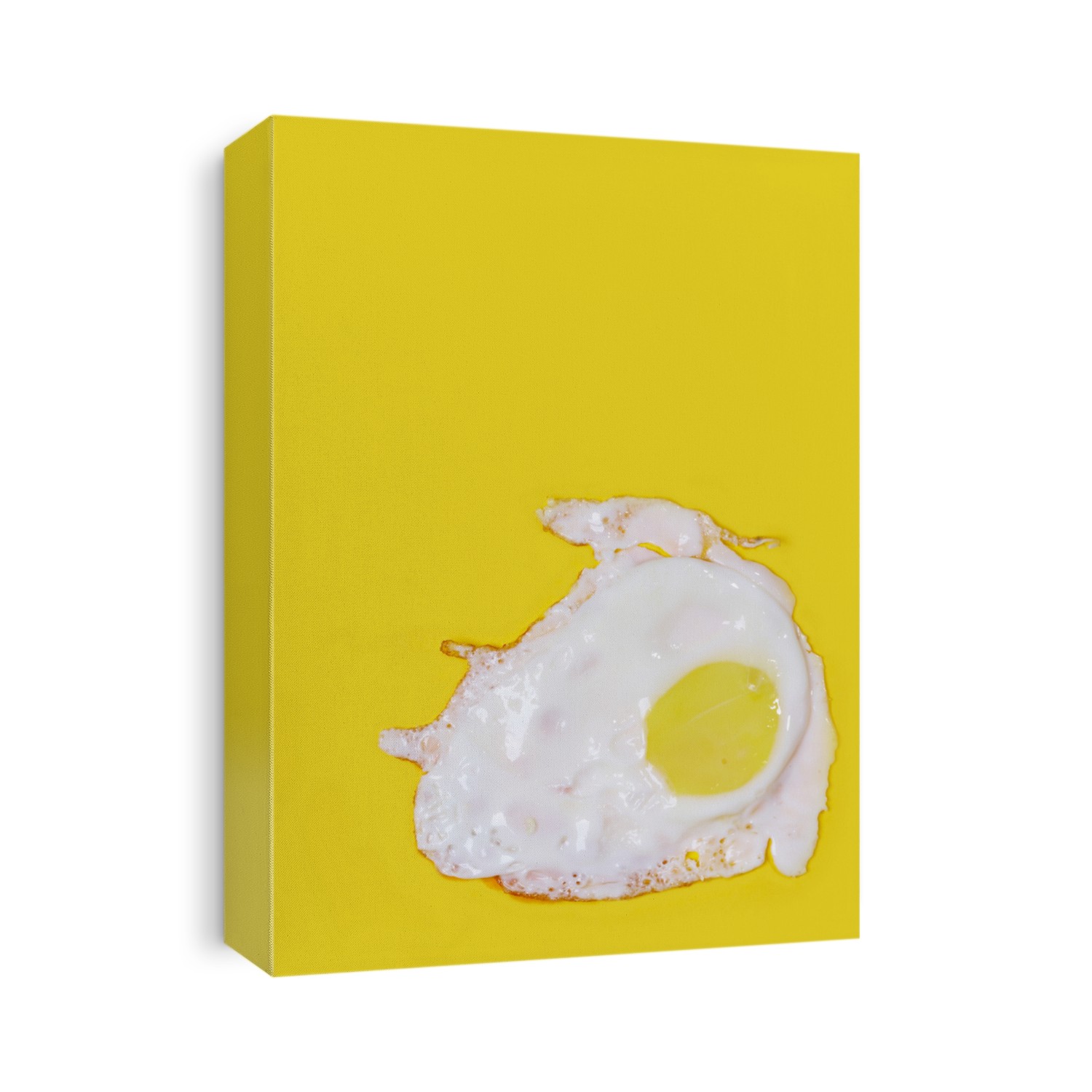 Yellow background with broken chicken an egg...